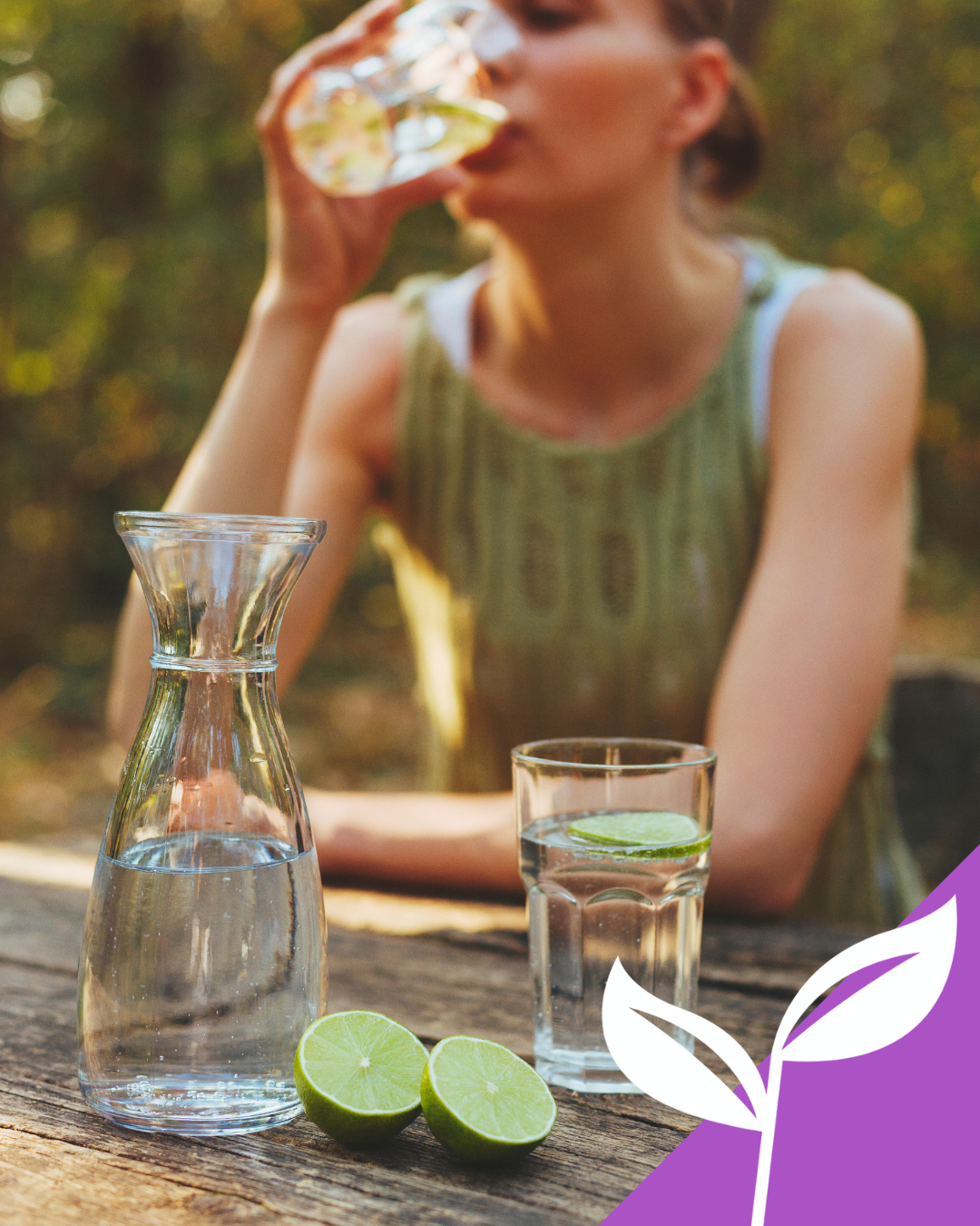 A NewUtrition client enjoying a refreshing drink outdoors